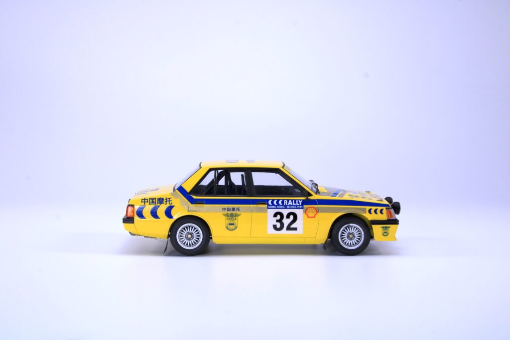 NuNu PN24032 Mitsubishi Lancer Turbo 85 Hong Kong-Beijing Rally 1/24 – image 7